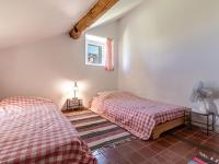 Łóżko lub łóżka w pokoju w obiekcie Holiday Home Maison Penta by Interhome