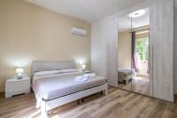 Posteľ alebo postele v izbe v ubytovaní Vico Rooms