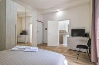 Posteľ alebo postele v izbe v ubytovaní Vico Rooms