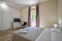Posteľ alebo postele v izbe v ubytovaní Vico Rooms