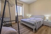 Posteľ alebo postele v izbe v ubytovaní Vico Rooms
