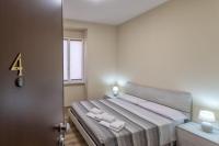 Posteľ alebo postele v izbe v ubytovaní Vico Rooms