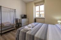 Posteľ alebo postele v izbe v ubytovaní Vico Rooms