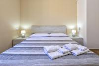 Posteľ alebo postele v izbe v ubytovaní Vico Rooms