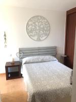 Postel nebo postele na pokoji v ubytování Bella Vista