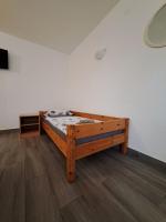 Posteľ alebo postele v izbe v ubytovaní Apartman Morana