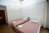 Posteľ alebo postele v izbe v ubytovaní Harmony Apartment Kavala