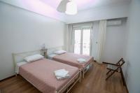 Posteľ alebo postele v izbe v ubytovaní Harmony Apartment Kavala