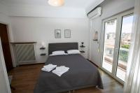 Posteľ alebo postele v izbe v ubytovaní Harmony Apartment Kavala