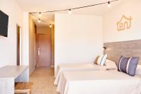 Postel nebo postele na pokoji v ubytování tent Torremolinos