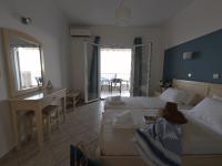 Posteľ alebo postele v izbe v ubytovaní Filanthi Apartments