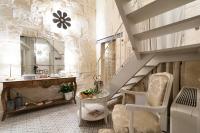 A seating area at Palazzo Mandurino luxury relais