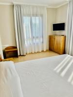 Posteľ alebo postele v izbe v ubytovaní Duerming Montalvo Playa Hotel