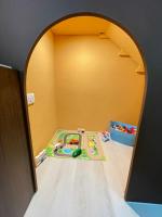 a childs play room with an archway in the floor at Misto B&amp;B in Taitung City