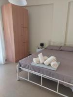 Posteľ alebo postele v izbe v ubytovaní Luminosa Seaview Apartment