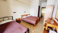 A bed or beds in a room at Cactus rooms