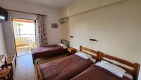 A bed or beds in a room at Cactus rooms