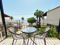 A balcony or terrace at Cactus rooms