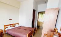 A bed or beds in a room at Cactus rooms