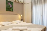 Postel nebo postele na pokoji v ubytování Plaza Hotel