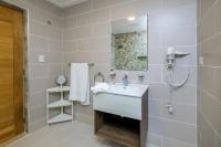 Koupelna v ubytování Amar'e Aparthotel & Spa