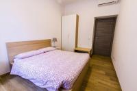 Posteľ alebo postele v izbe v ubytovaní Colossehome - Dream House around the corner from Colosseum