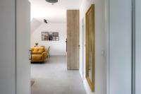 Łóżko lub łóżka w pokoju w obiekcie Apartamenty Zielona Lipka