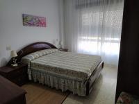 Postel nebo postele na pokoji v ubytování Vacaciones en O Grove