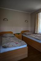 Posteľ alebo postele v izbe v ubytovaní Pokoje gościnne „SEN”