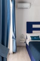 Posteľ alebo postele v izbe v ubytovaní B&B Sapore di Mare nel Blu