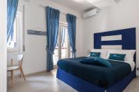 Posteľ alebo postele v izbe v ubytovaní B&B Sapore di Mare nel Blu