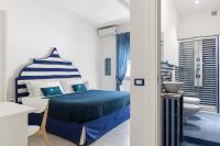 Posteľ alebo postele v izbe v ubytovaní B&B Sapore di Mare nel Blu