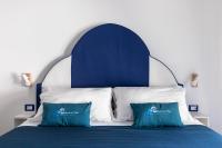 Posteľ alebo postele v izbe v ubytovaní B&B Sapore di Mare nel Blu