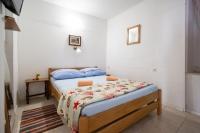 Posteľ alebo postele v izbe v ubytovaní Apartment Preko 8179b