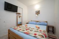Posteľ alebo postele v izbe v ubytovaní Apartment Preko 8179b
