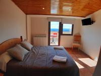 Postel nebo postele na pokoji v ubytování Apartamentos Mirador de Gúdar