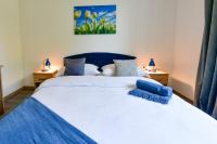 Posteľ alebo postele v izbe v ubytovaní Apartman PLUM PLITVICE