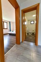 Posteľ alebo postele v izbe v ubytovaní Apartman PLUM PLITVICE
