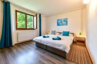 Posteľ alebo postele v izbe v ubytovaní Apartman PLUM PLITVICE