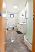 Kúpeľňa v ubytovaní Apartman PLUM PLITVICE