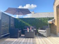 Część wypoczynkowa w obiekcie Gîte La Terrasse du 37