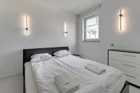 Posteľ alebo postele v izbe v ubytovaní Dom & House - Apartamenty Sunrise