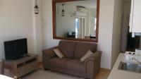 Televízia a/alebo spoločenská miestnosť v ubytovaní Apartamento Pueblo Marinero Puerto Sherry