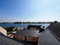 a view of a river from the roofs of buildings at 30 m des Plages - Port du Magouër - 6 invités in Plouhinec