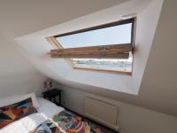 a bedroom with a window and a bed in it at 30 m des Plages - Port du Magouër - 6 invités in Plouhinec