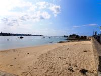 a sandy beach with boats in the water at 30 m des Plages - Port du Magouër - 6 invités in Plouhinec