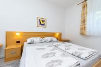 Posteľ alebo postele v izbe v ubytovaní Apartments Angel