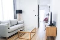 Televízia a/alebo spoločenská miestnosť v ubytovaní Aqua Apartments Málaga