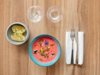 una mesa con un tazón de sopa y un plato de comida en Novotel Paris Centre Tour Eiffel, en París