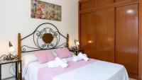 Postel nebo postele na pokoji v ubytování Home Victoria Playa Málaga
